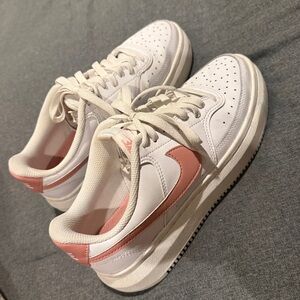 Nike Women’s White Sneakers with Pink Swoosh
